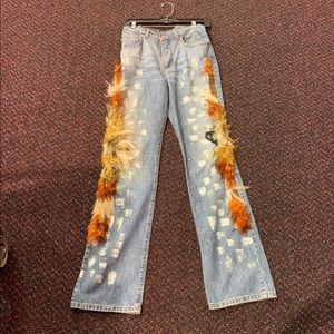 Feather legate jeans. Size 2. Made in italy.